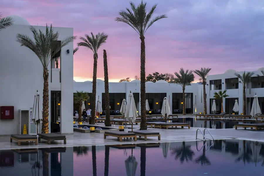 Hotel facade and entrance at dusk